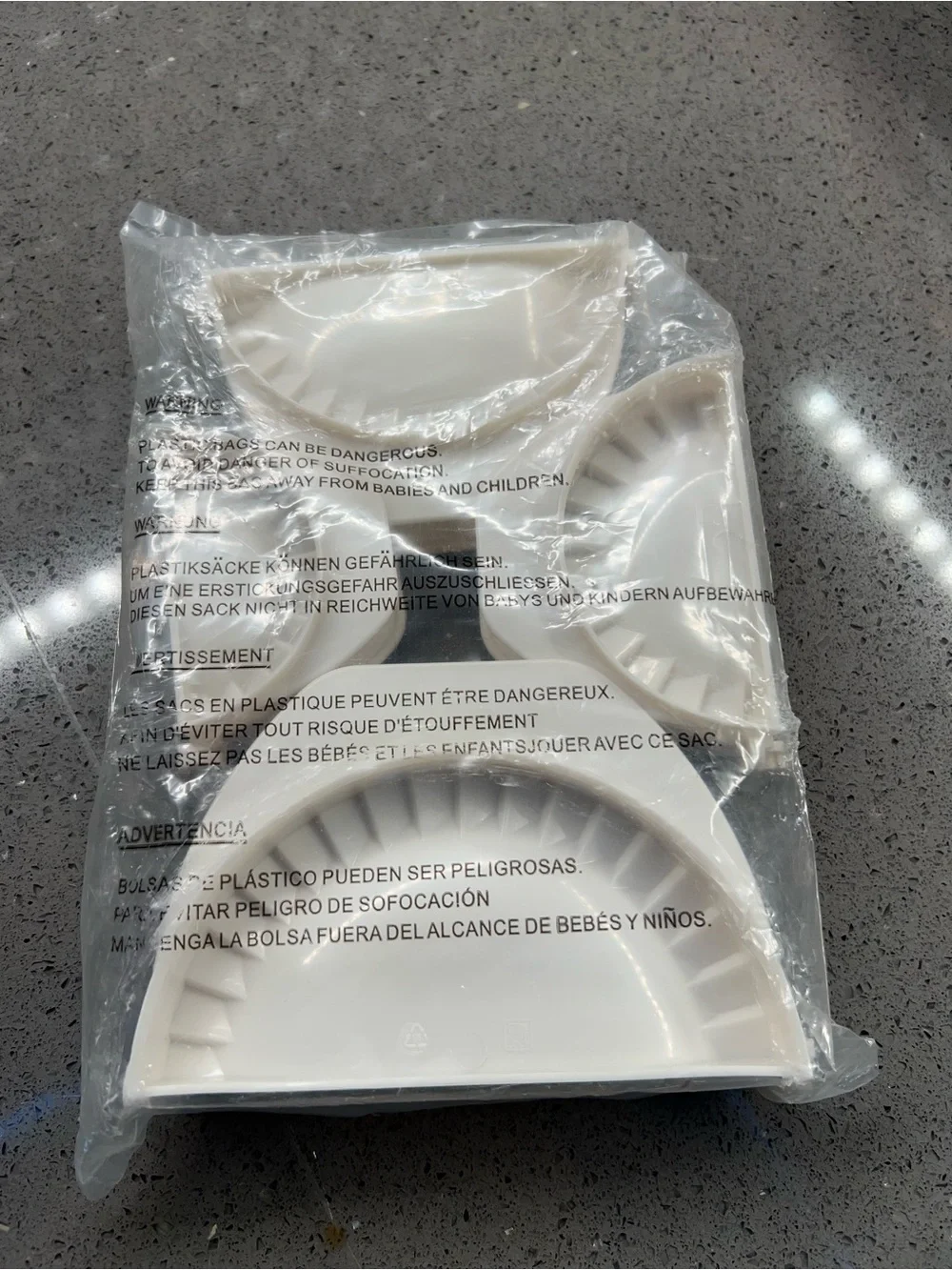 This is a set of white plastic dumpling, empanada, and pastry presses new